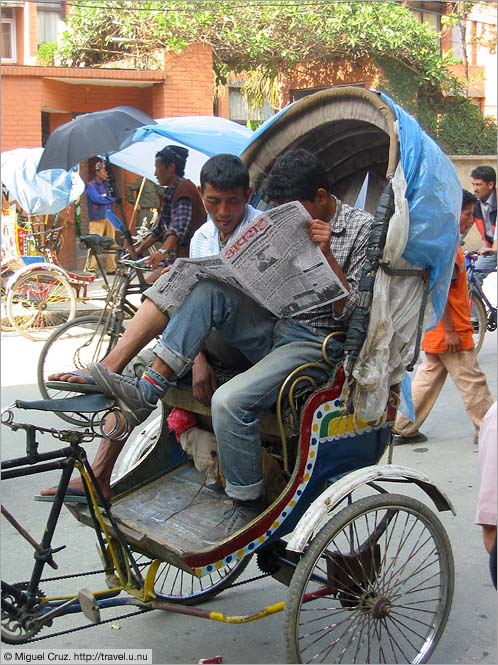Nepal: Kathmandu: Resting in the rickshaw